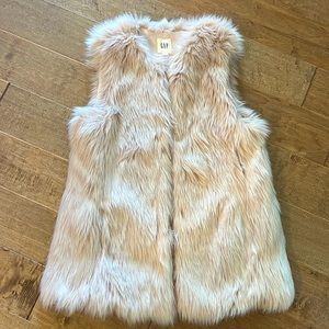 Super festive blush fur vest!